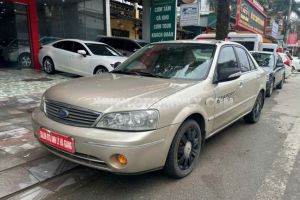 Xe Ford Laser GHIA 1.8 MT 2004