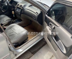 Xe Ford Laser GHIA 1.8 MT 2002